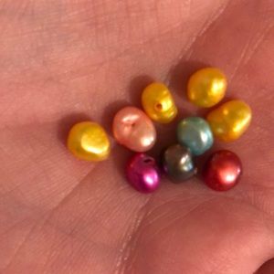 Natural pearls and cages